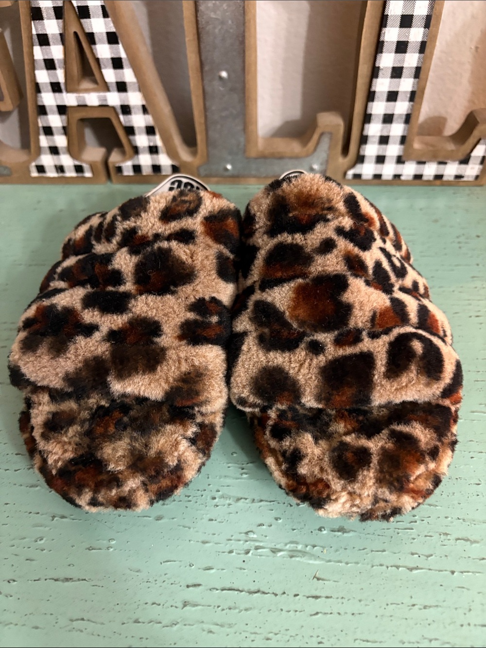 UGG Leopard Print Fuzzy Slides in Brown and Black